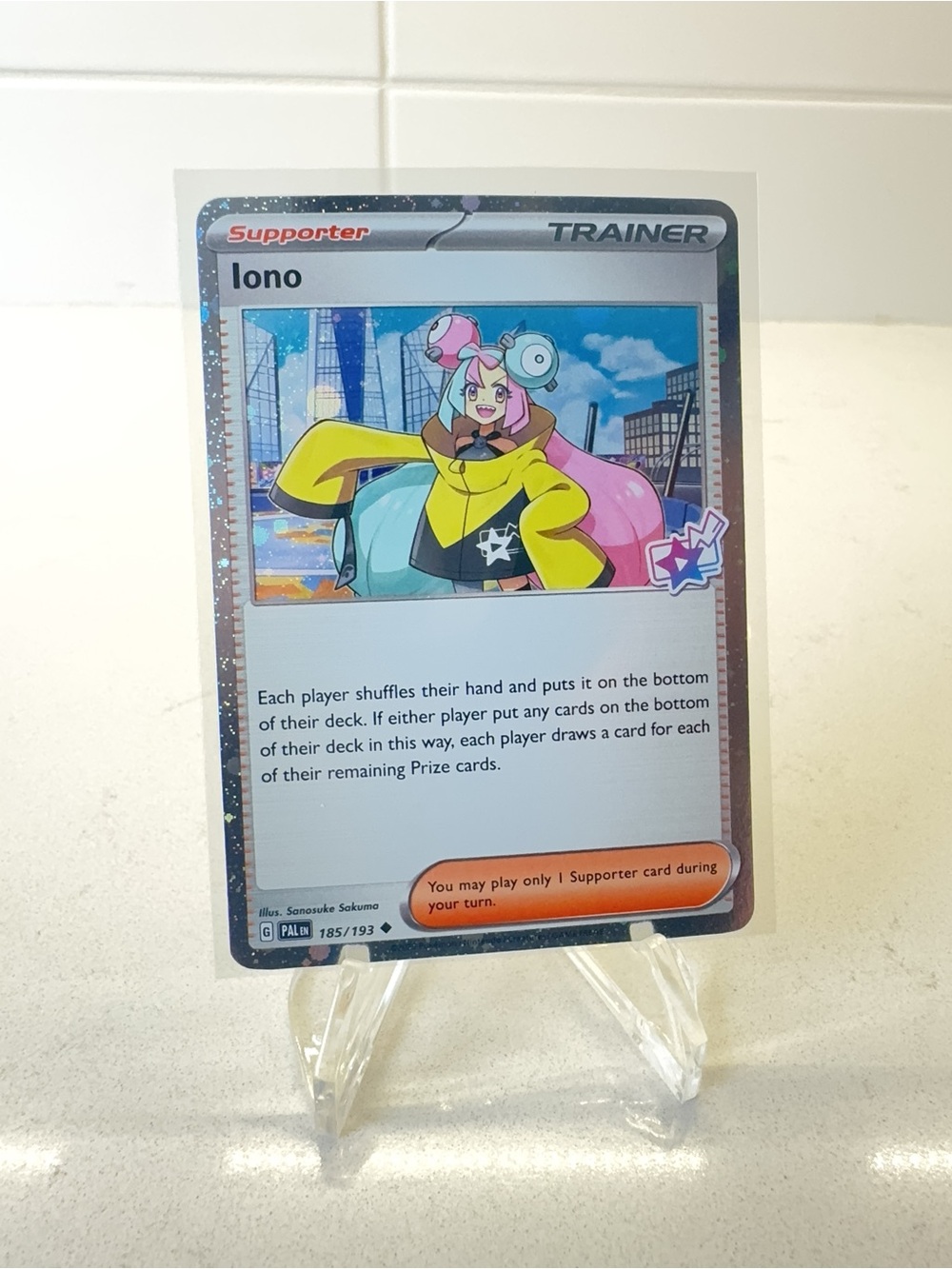 Pokemon TCG Card -  Iono [Cosmo Holo] #185 Pokemon Paldea Evolved